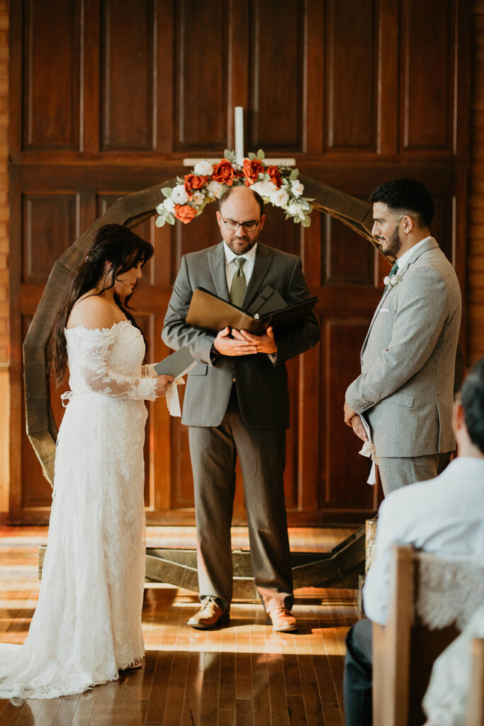 The bride giving her vows to the groom. 