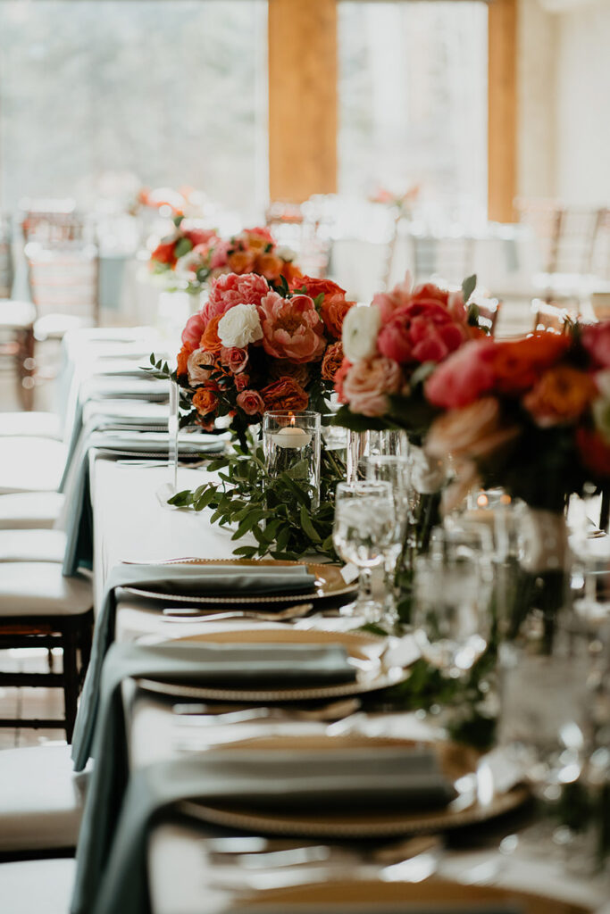 Details of the reception, including roses, and dinnerware. 