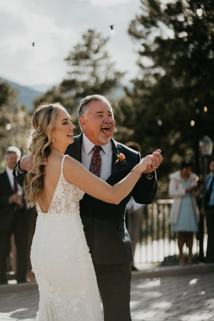 A father-daughter dance at during an Estes Park Wedding. 