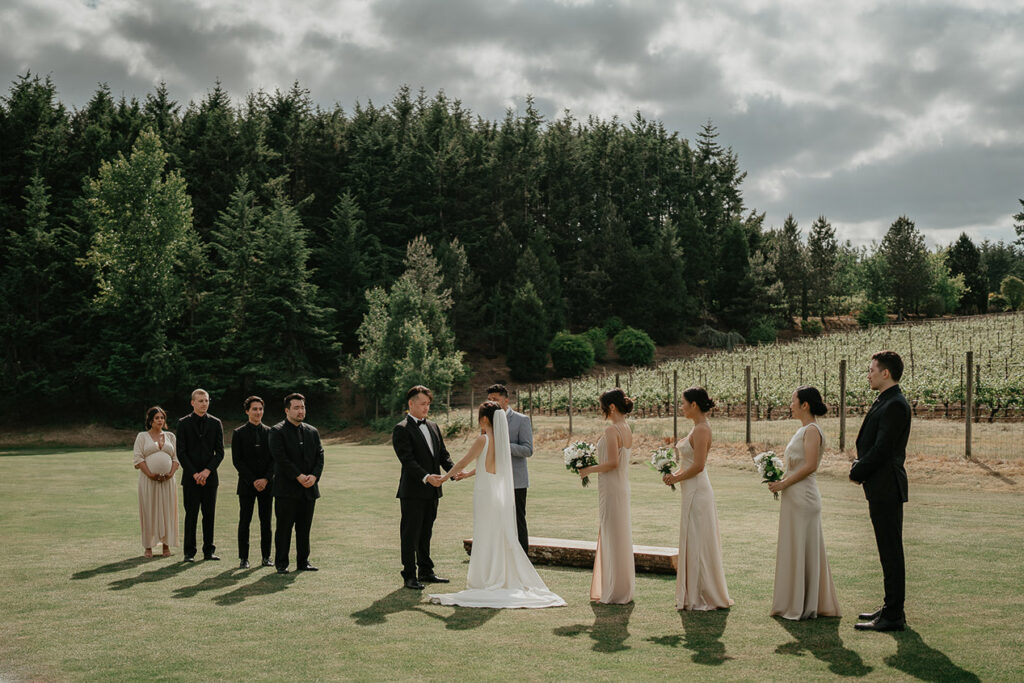 Judith, Joshua, their wedding party, and their officiant. 