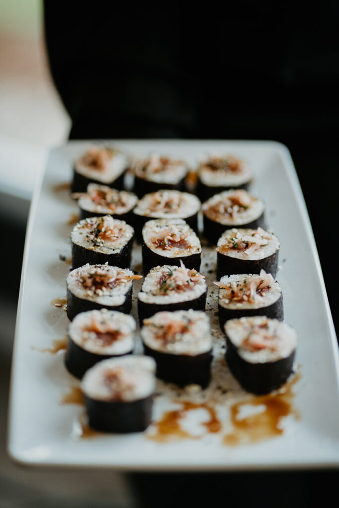 A close up on a plate of sushi. 