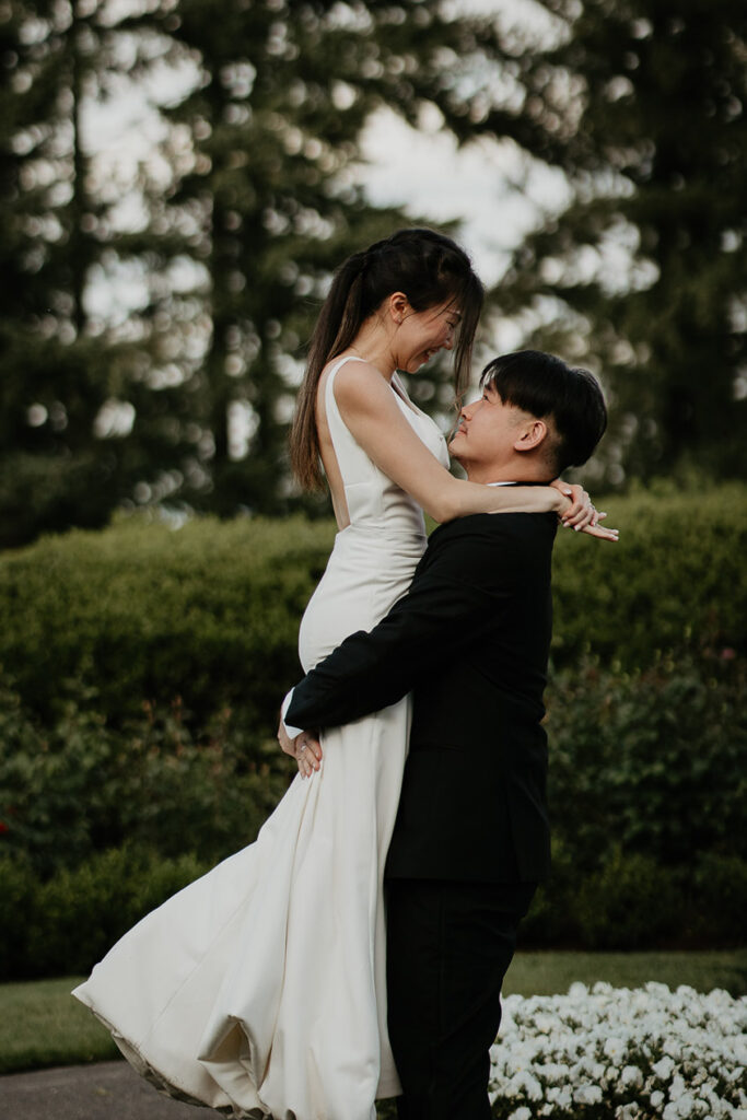 Joshua lifting up Judith after their ceremony. 