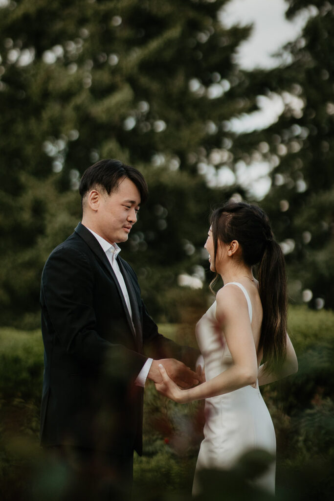 Judith and Joshua dancing in a courtyard. 