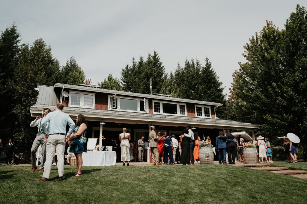 Guests mingling at Gorge Crest Vineyards wedding