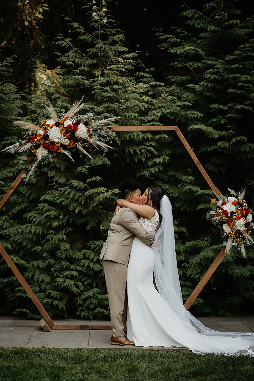 The brides kissing. 