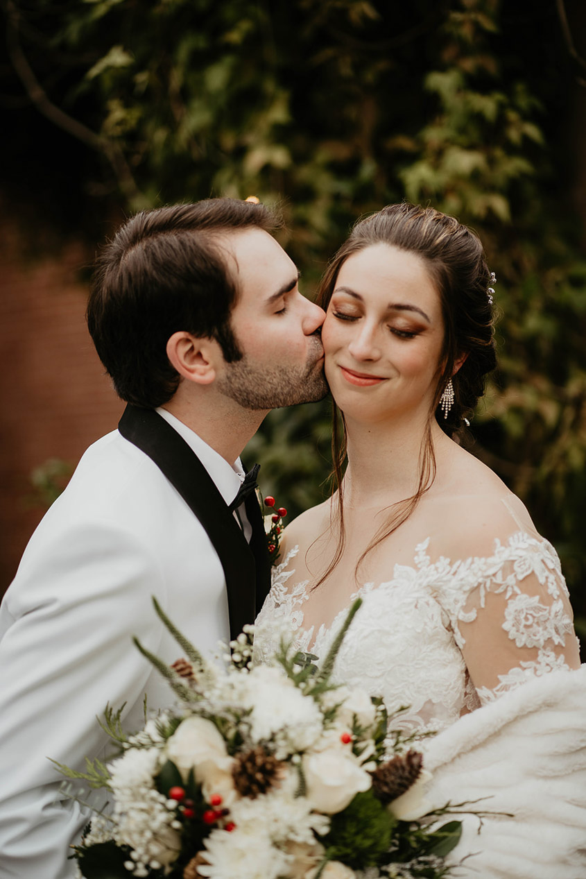 The bride and groom kissing at Lairmont Manor. 