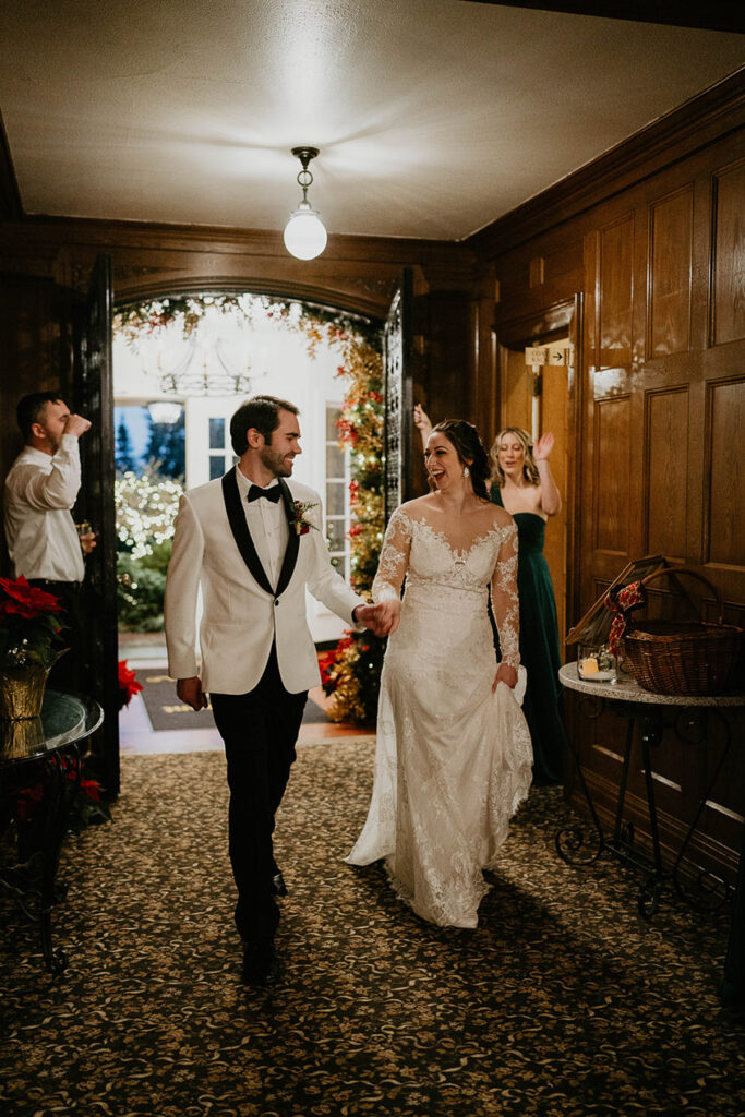 The newlyweds walking into the reception. 