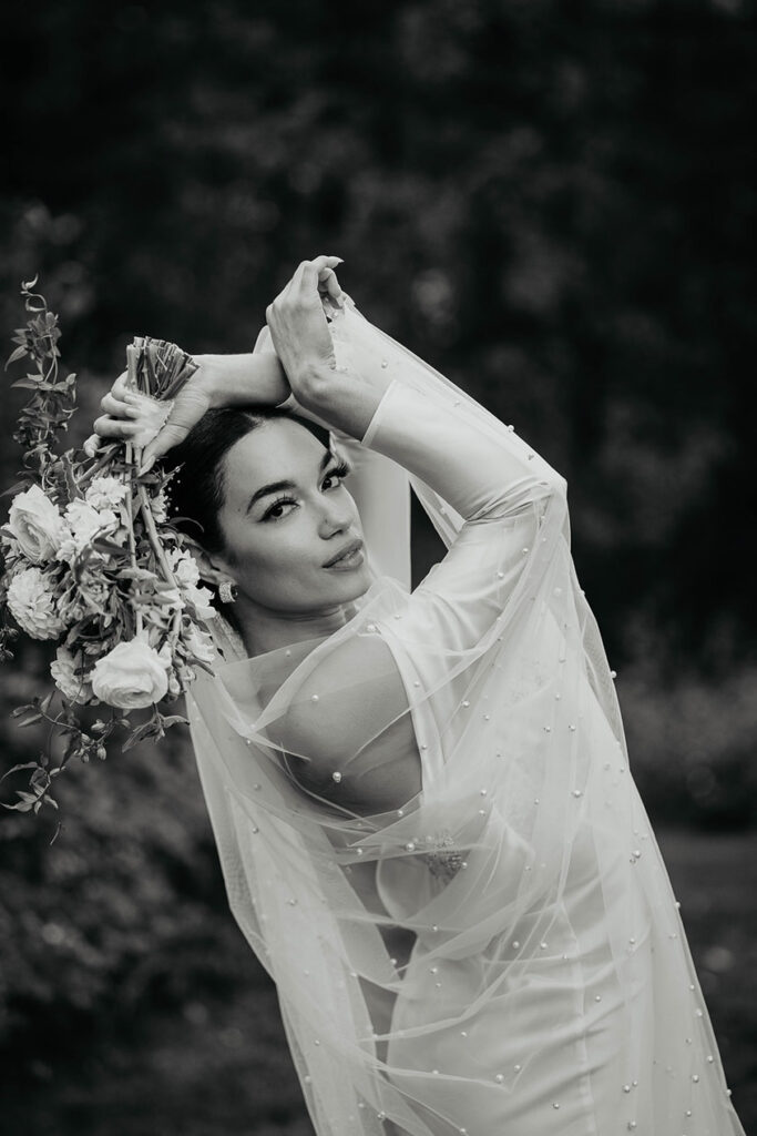 The bride showing off her veil. 