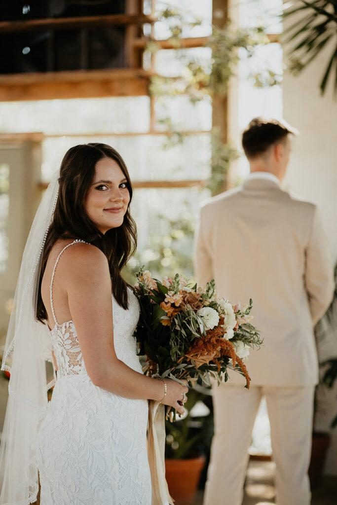 the bride and groom about to do their first look at the Mt Hood Center. 