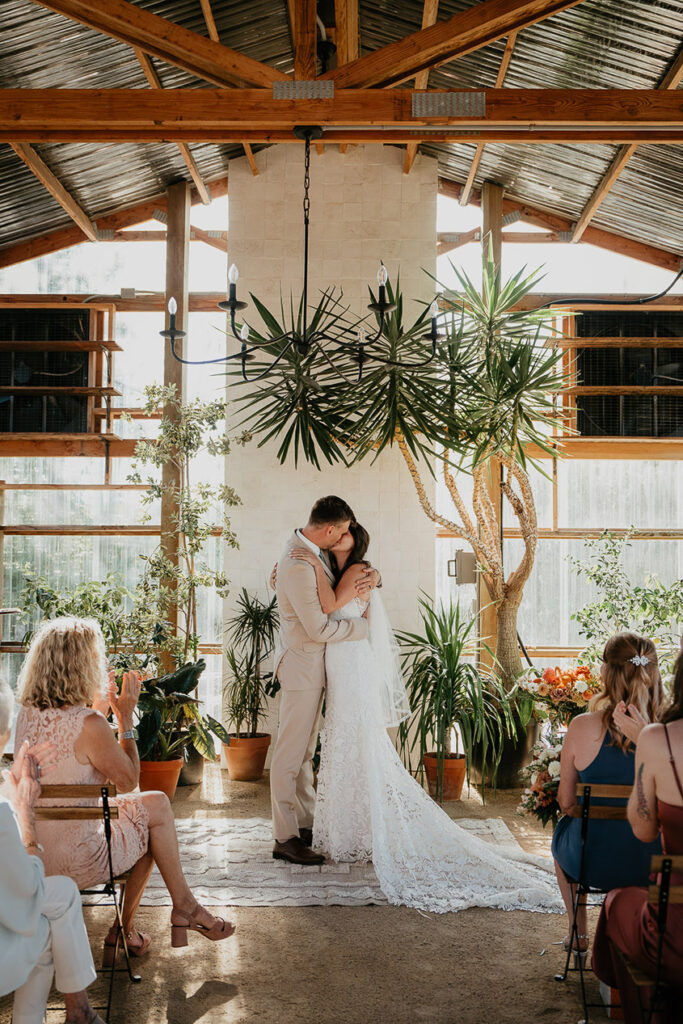 the first kiss as newlyweds inside the Mt Hood Center. 