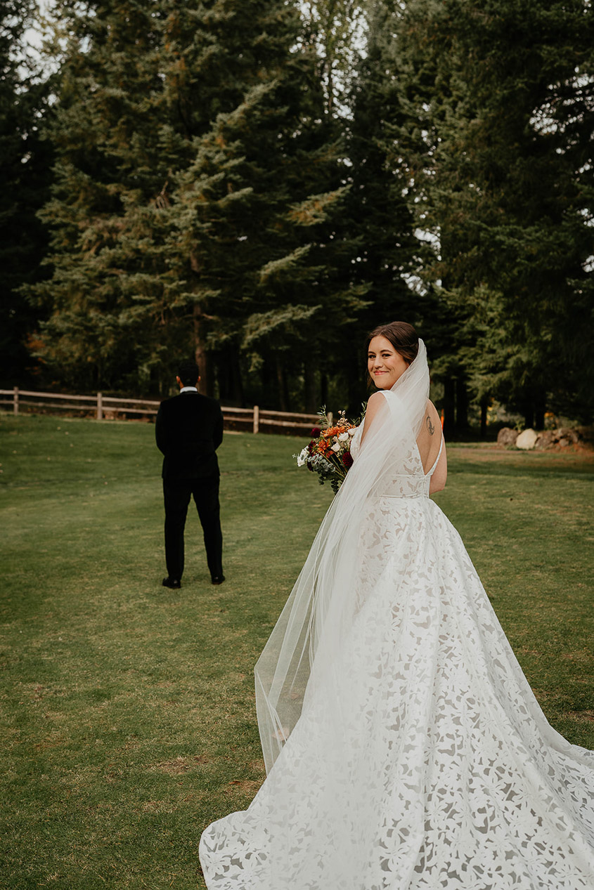 the bride about to have her first look with her groom. 