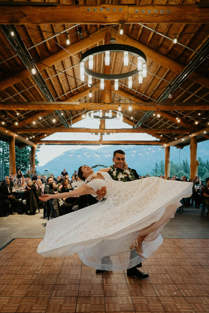 the bride and groom dancing on the dance floor at Skamania Lodge. 