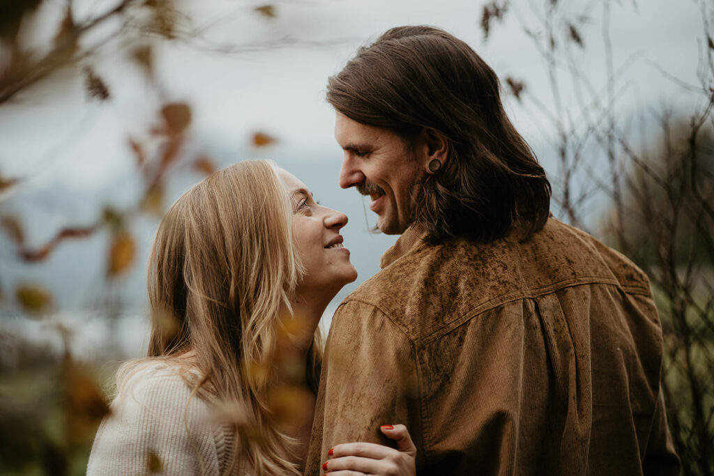 A couple holding each other in the Columbia River Gorge. 