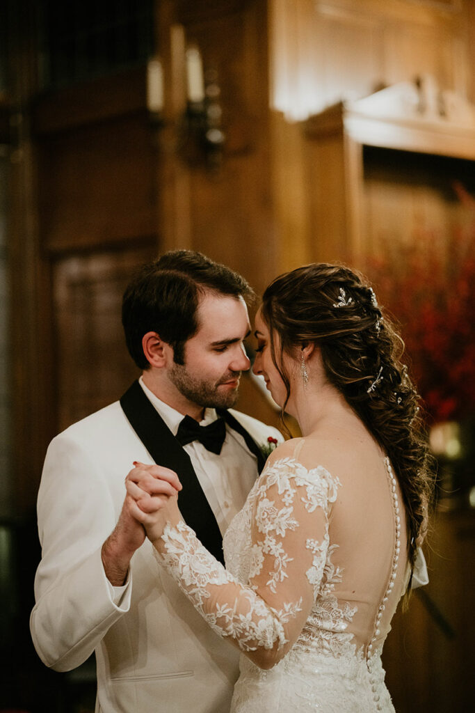 A newlywed couple dancing. 