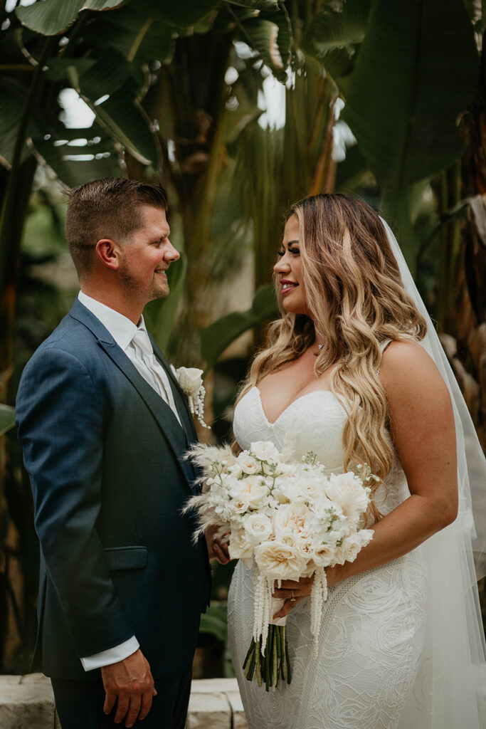 The bride and groom looking lovingly into each other's eyes during their Mexico destination wedding. 