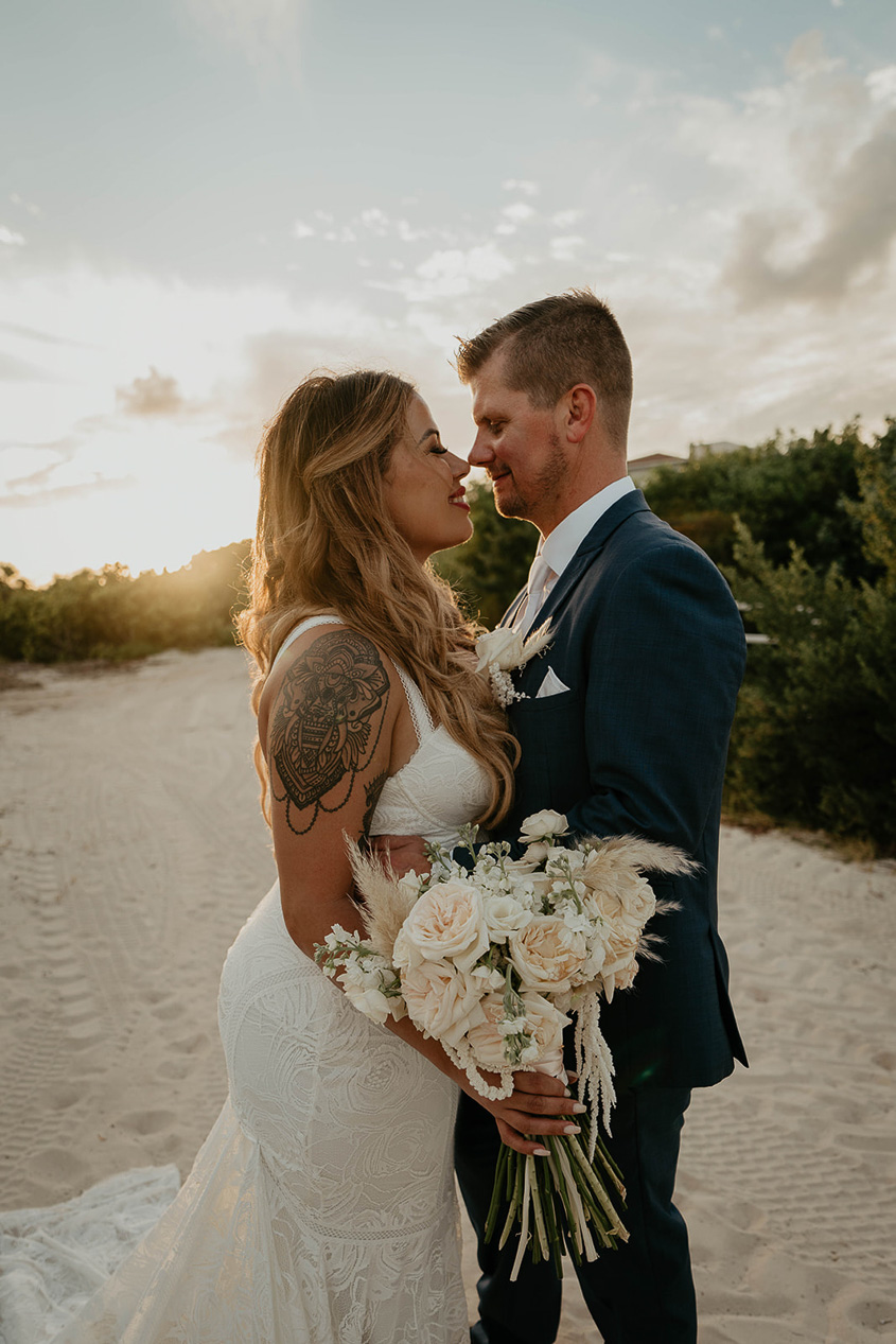 The bride and groom staring into each other's eyes during the Mexico destination wedding.