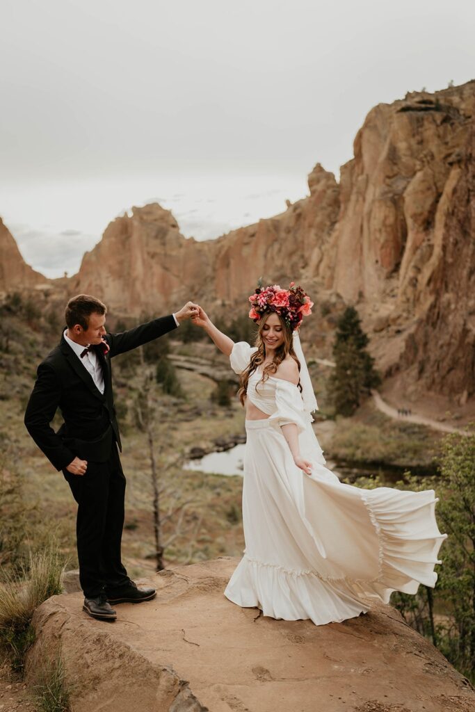 Bride and groom dance during their Smith Rock State Park elopement