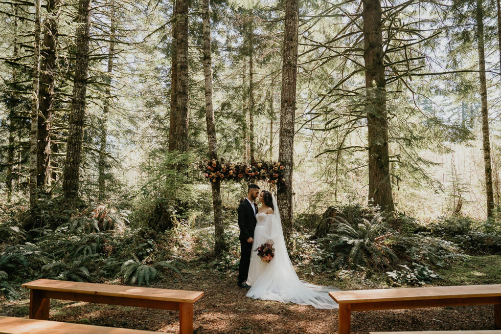 the bride and groom standing at the alter at Woodlands house venue's ceremony area. 