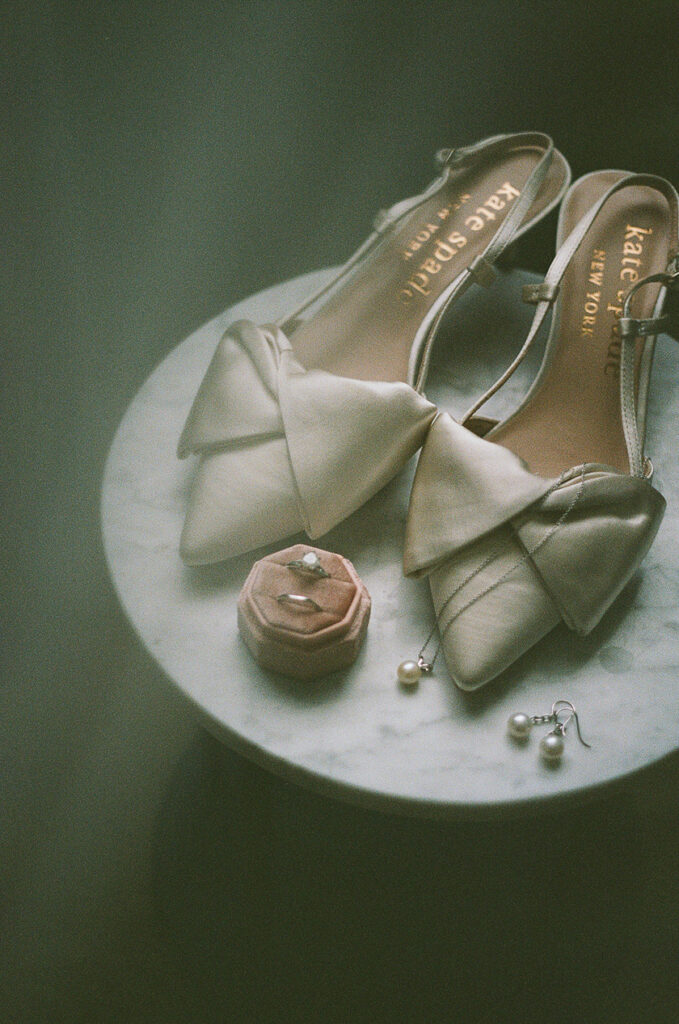 Shoes, fragrance, wedding rings, and earrings. 