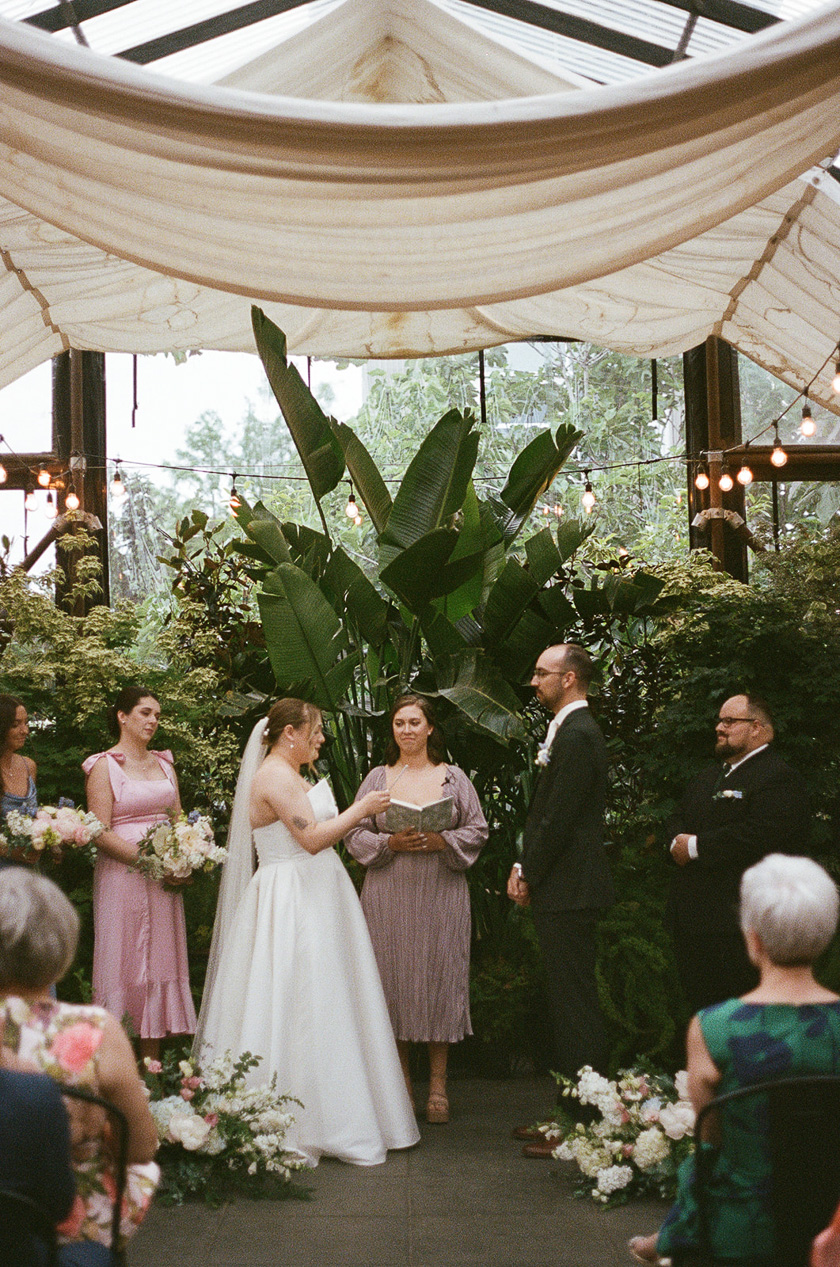 the bride and groom sharing their vows during their Blockhouse PDX wedding. 