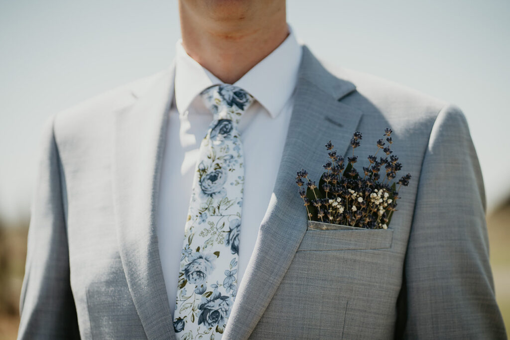 The groom's suit jacket, with lavender in his pocket. 