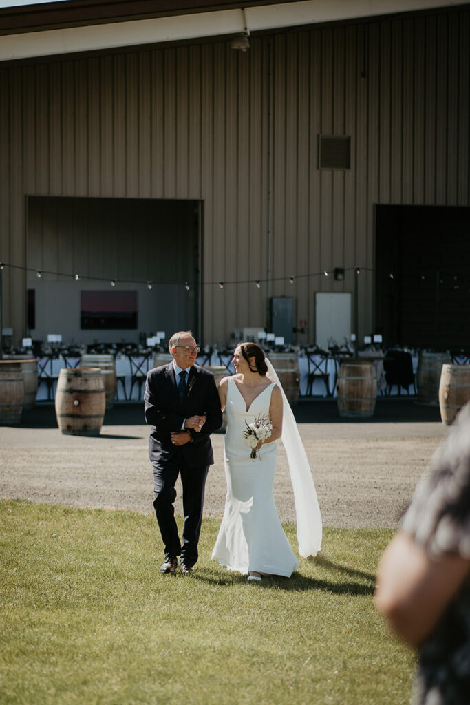 the bride's father walking her down the isle. 