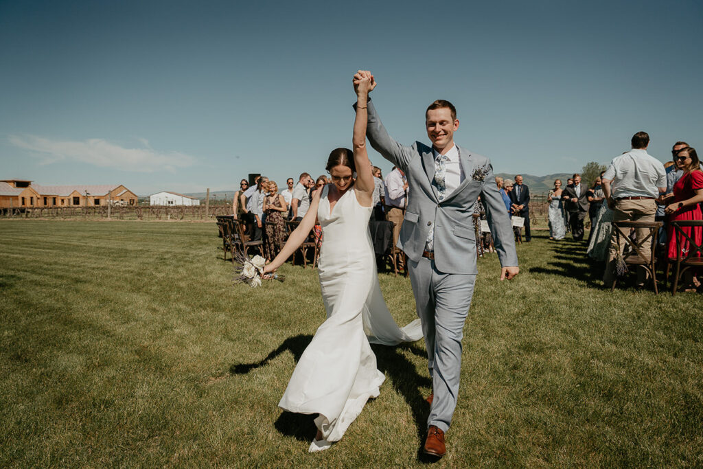 the newlyweds exiting their ceremony. 