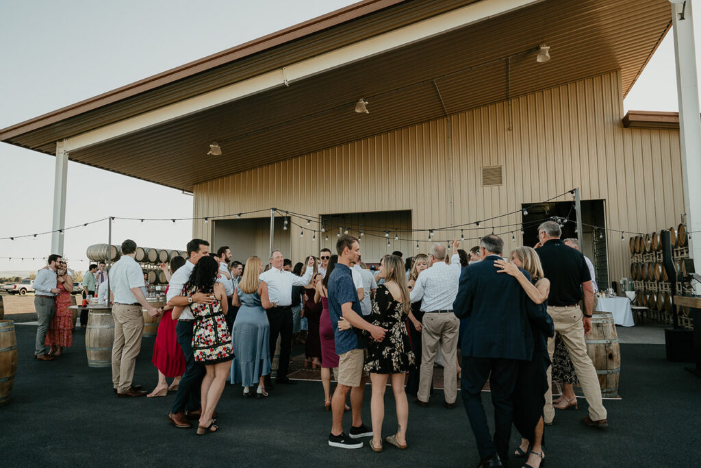 couples holding each other and dancing at Dusted Valley. 