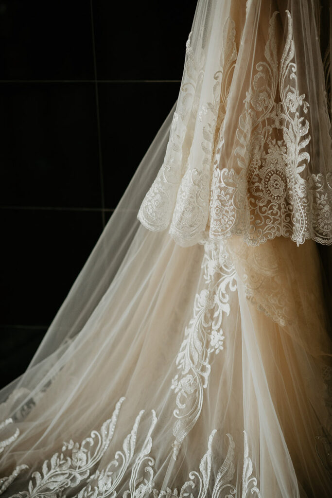 A wedding dress with it's details highlighted. 