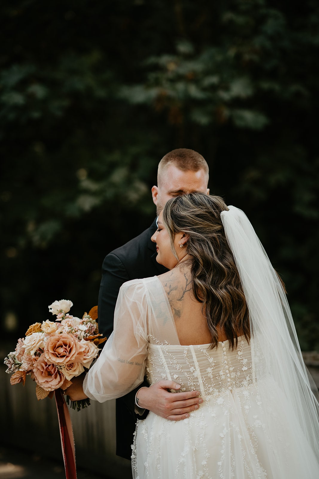 Bride and groom get teary eyed during their wedding first look in Oregon