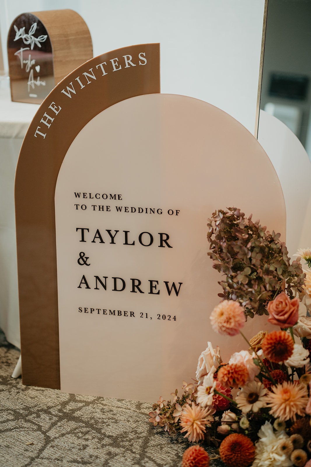 Brown and beige custom wedding signage at Ironlight wedding venue