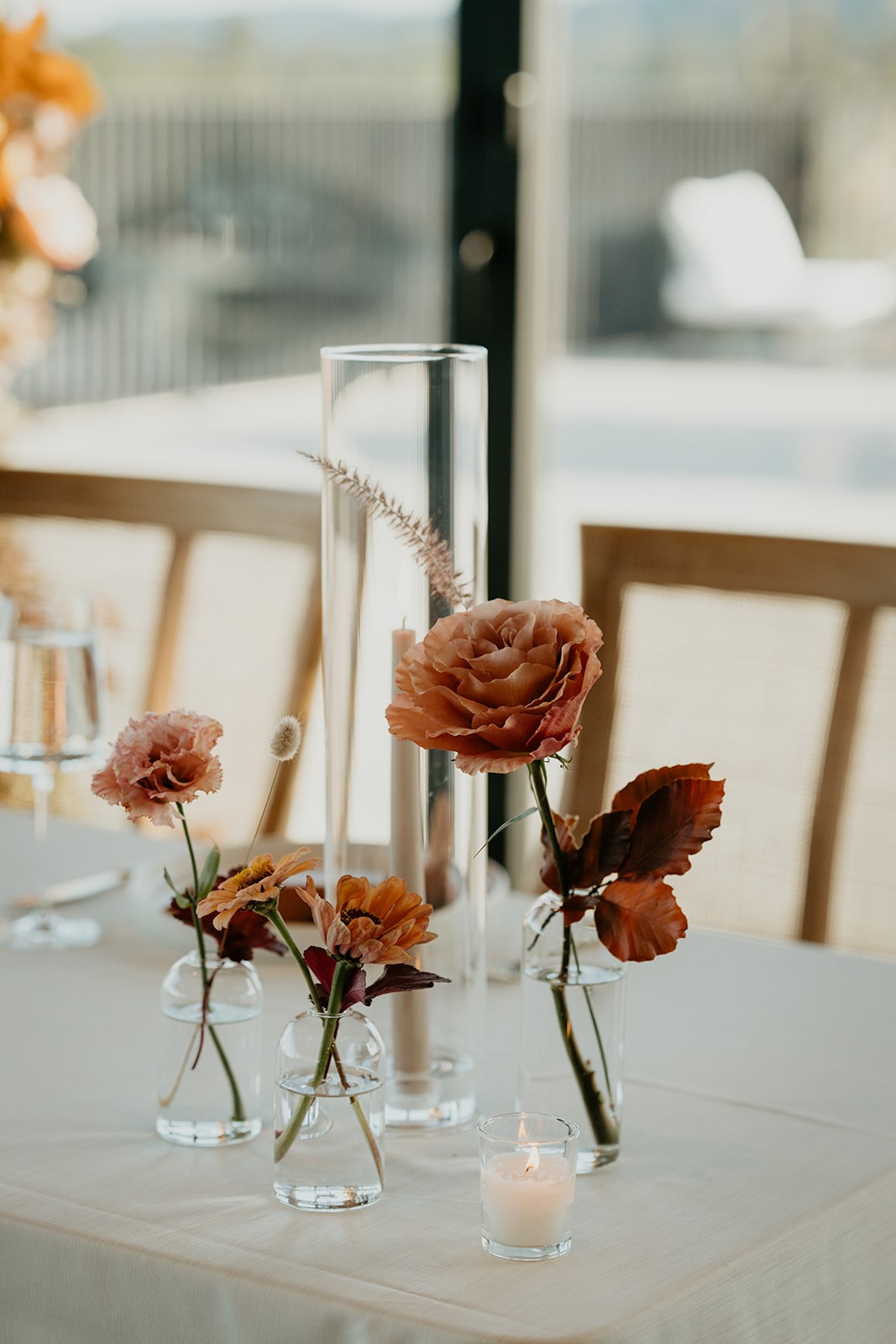 Orange and pale pink bud vases 