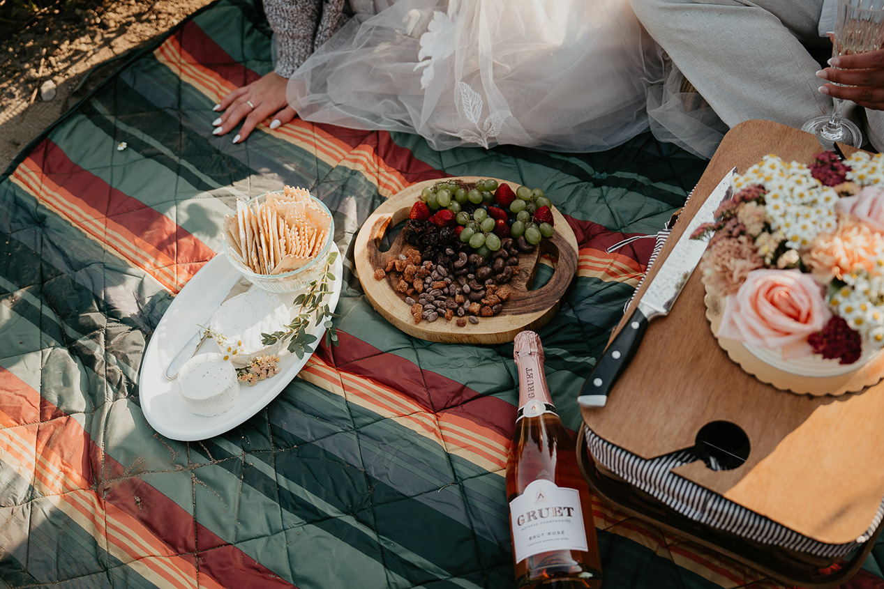 a picnic with wine and a charcuterie board.
