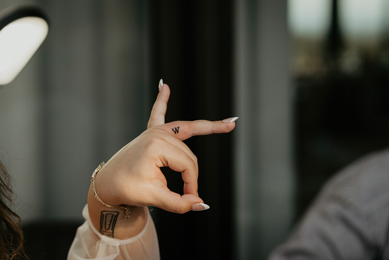 the bride showing off her new tattoo.