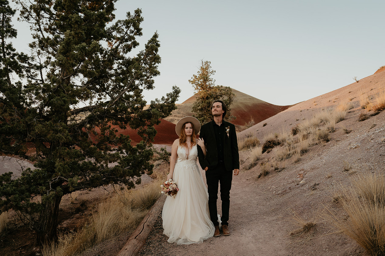 newlyweds on a hiking trail in the Oregon backcountry.