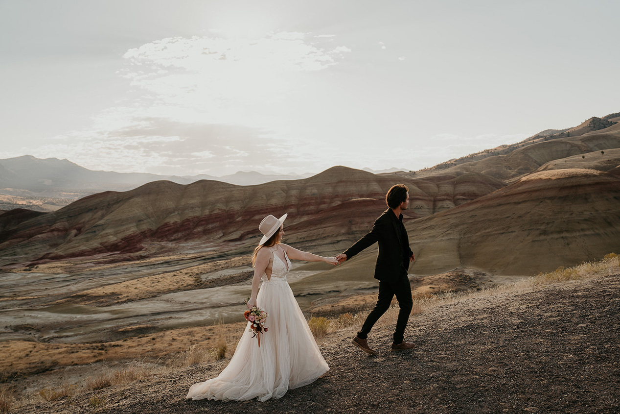 the newlyweds hiking in Oregon's backcountry.