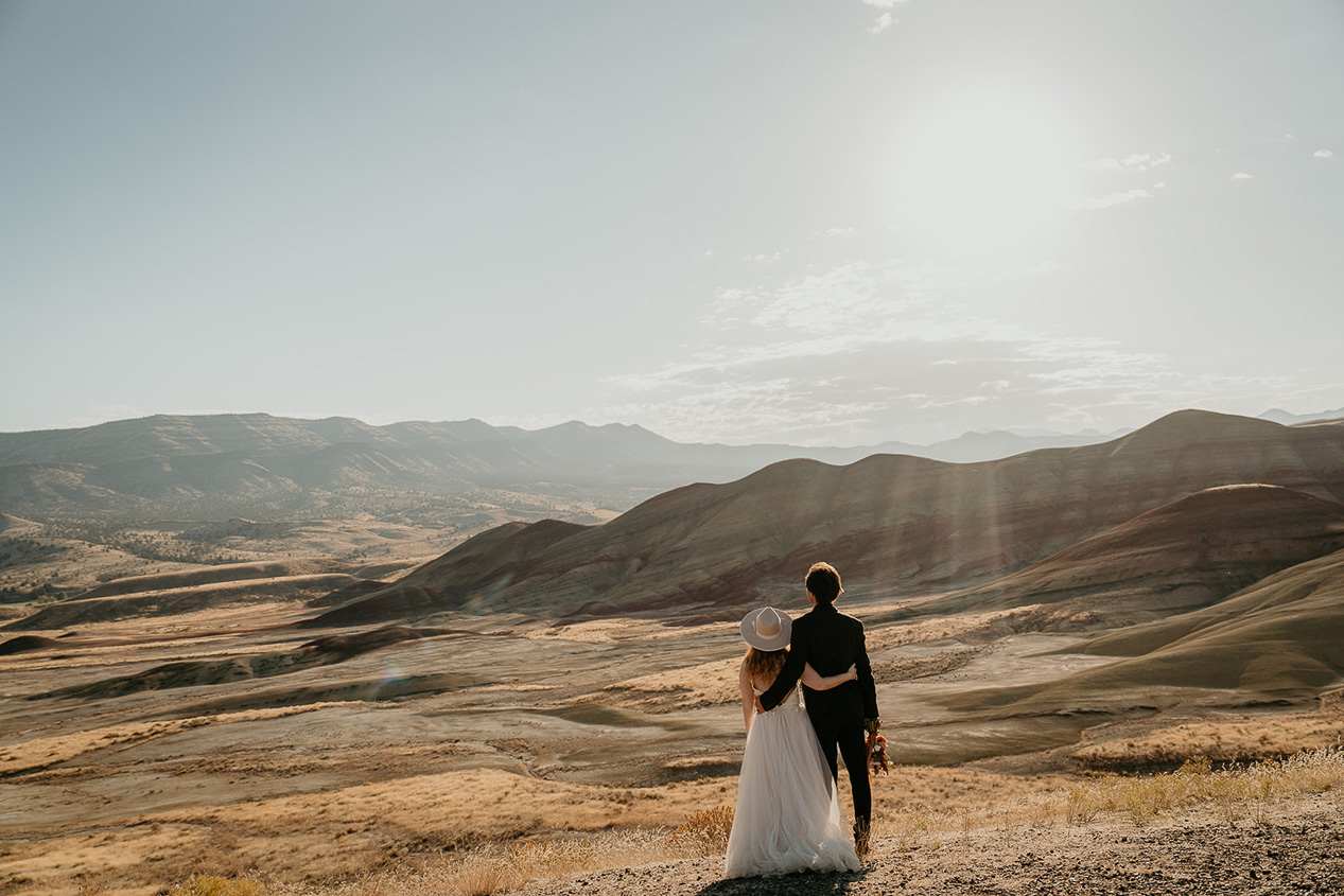 the newlyweds taking in the sunset.