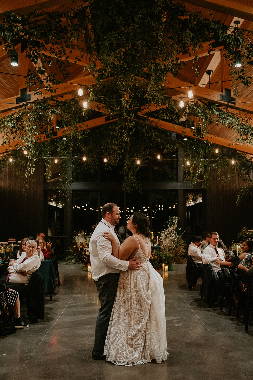 the newlyweds dancing during their wedding reception.