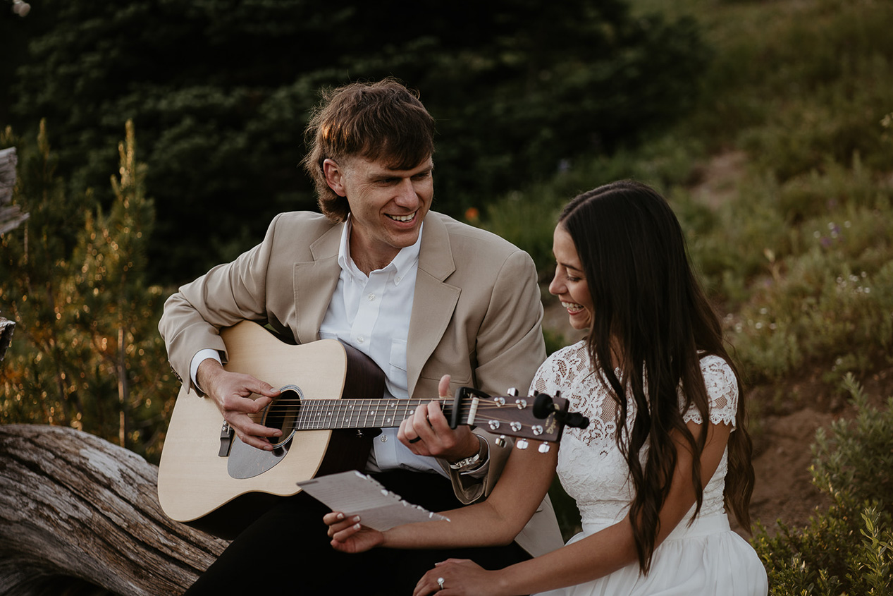 a couple serenading each other during their elopement, one of the ways an elopement ceremony can look like.