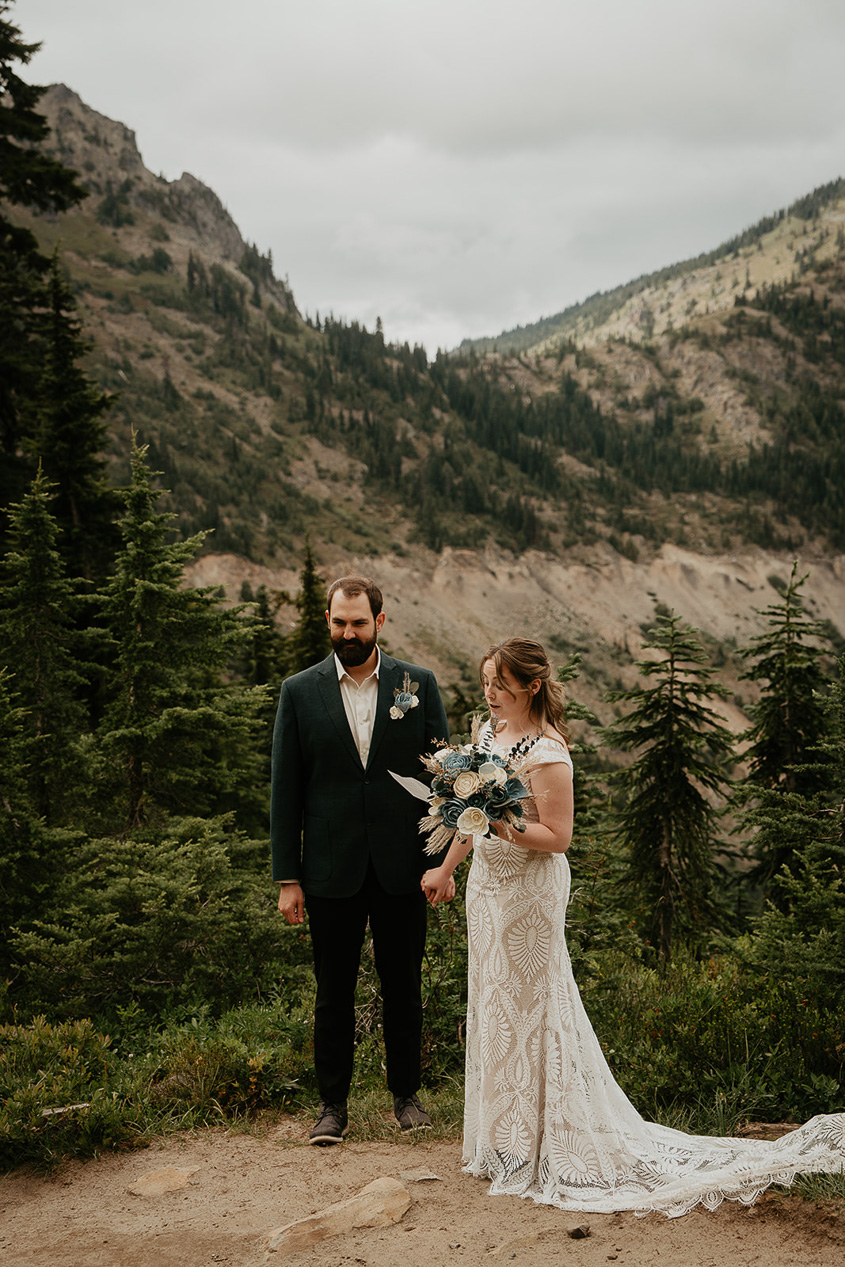 a couple holding their elopement ceremony in the mountains.