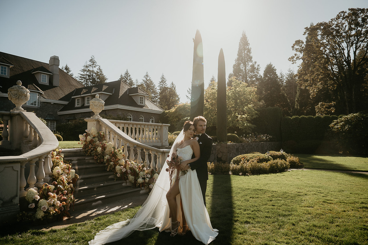 a couple posing in a Chateau de Michellia during their wedding.