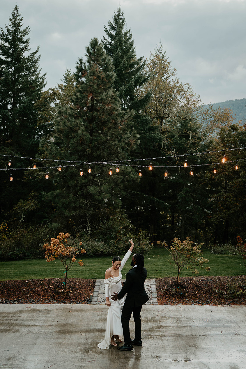 a couple dancing on a patio at rocky hill events, one of the best columbia river gorge wedding venues.