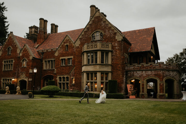newlyweds running in front of the thornewood castle wedding venue.