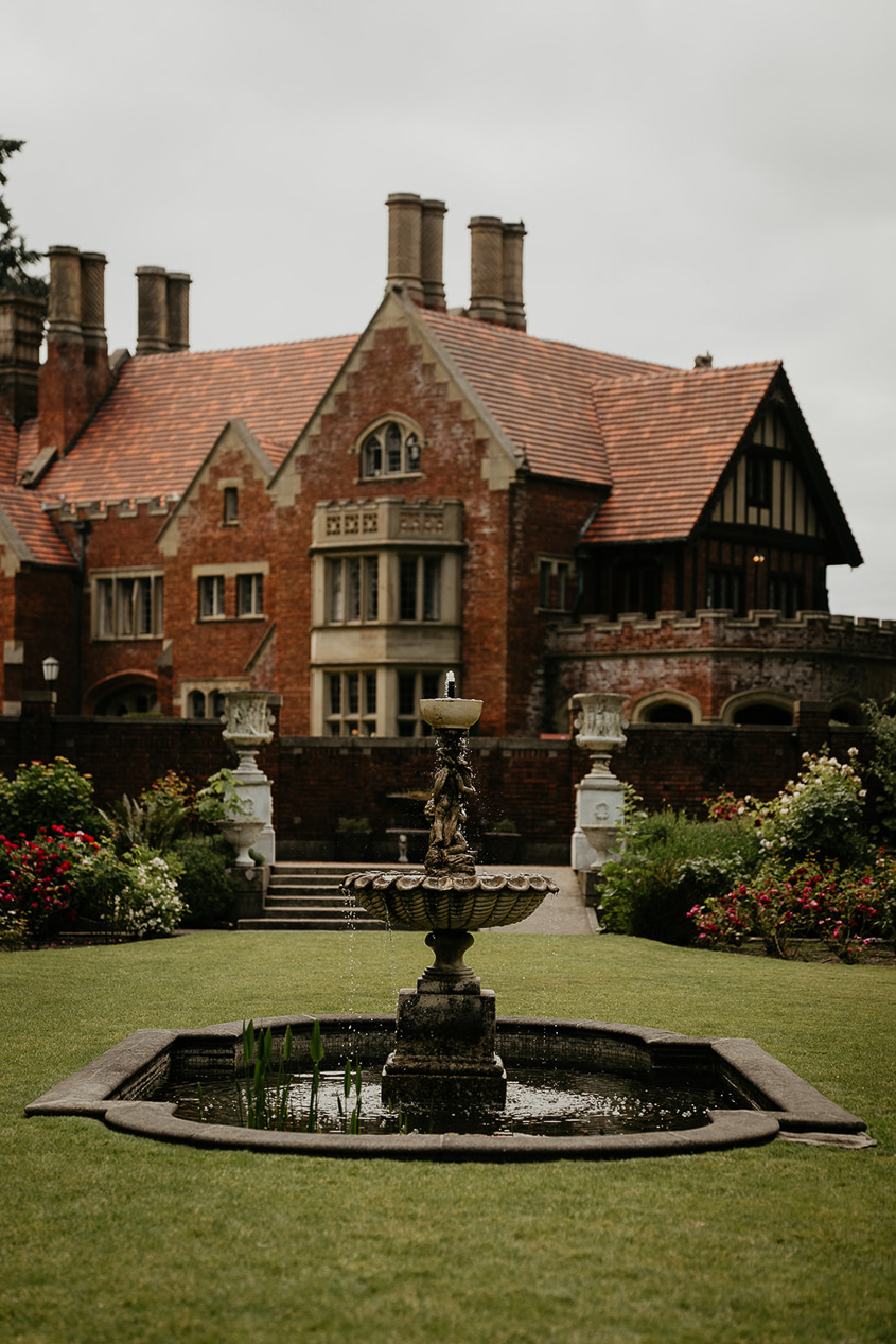 a fountain and the thornewood castle wedding venue exterior.
