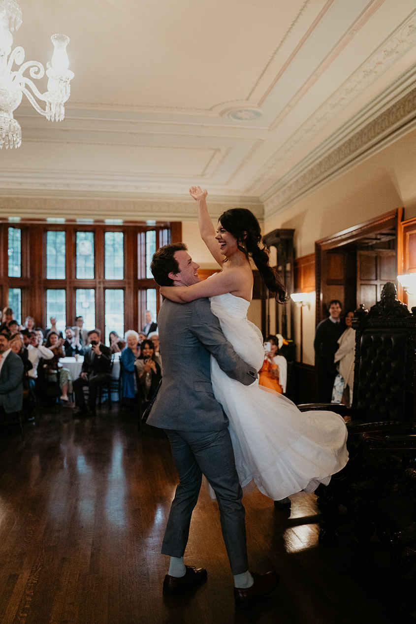 the newlyweds dancing after getting married.