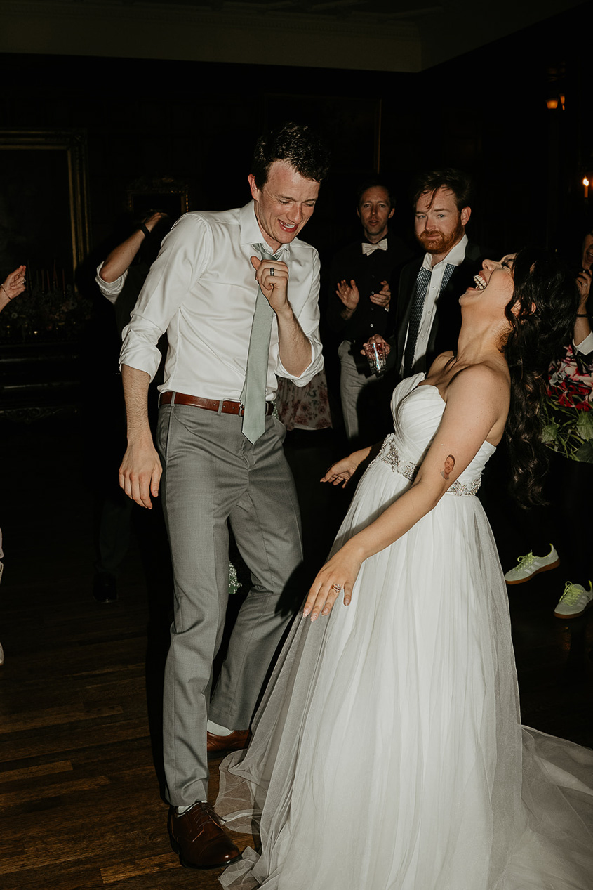 the newlyweds dancing during their thornewood castle wedding.