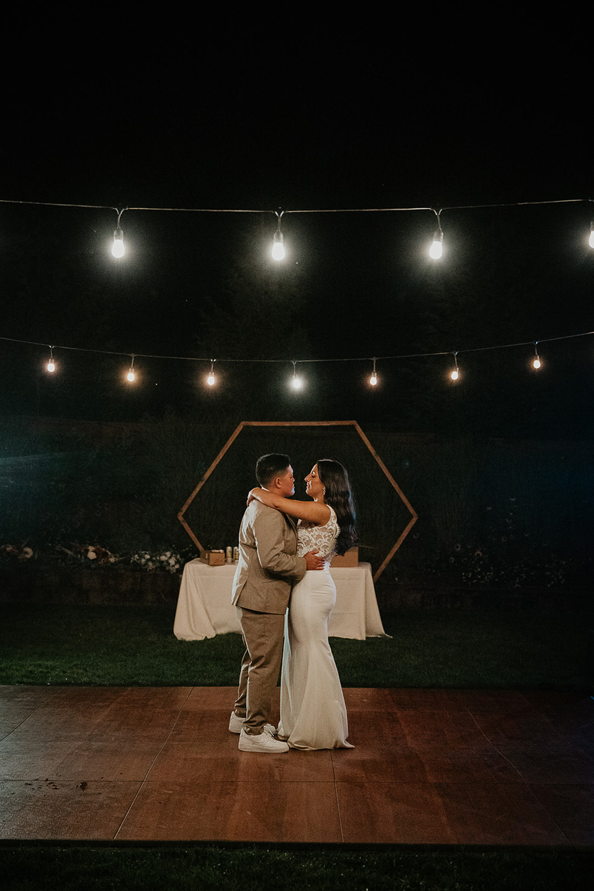newlyweds dancing on the dance floor at CedarVale Events.