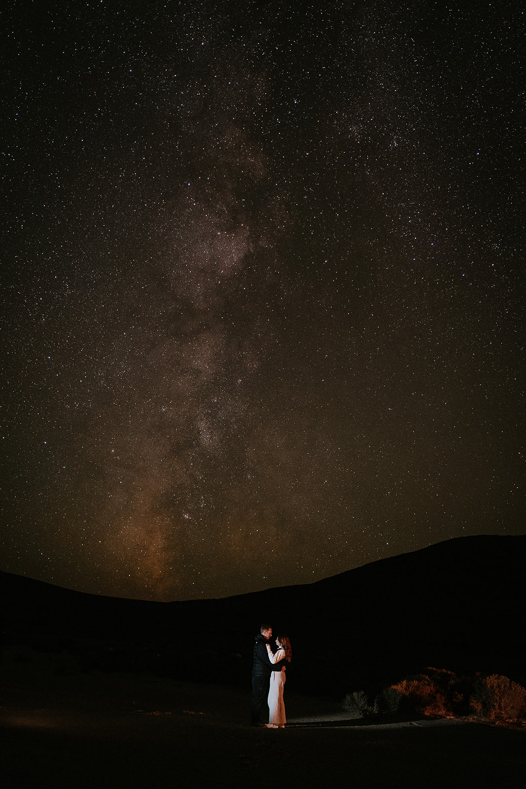 newlyweds under the milky way sky during their Alvord Desert, Oregon elopement.