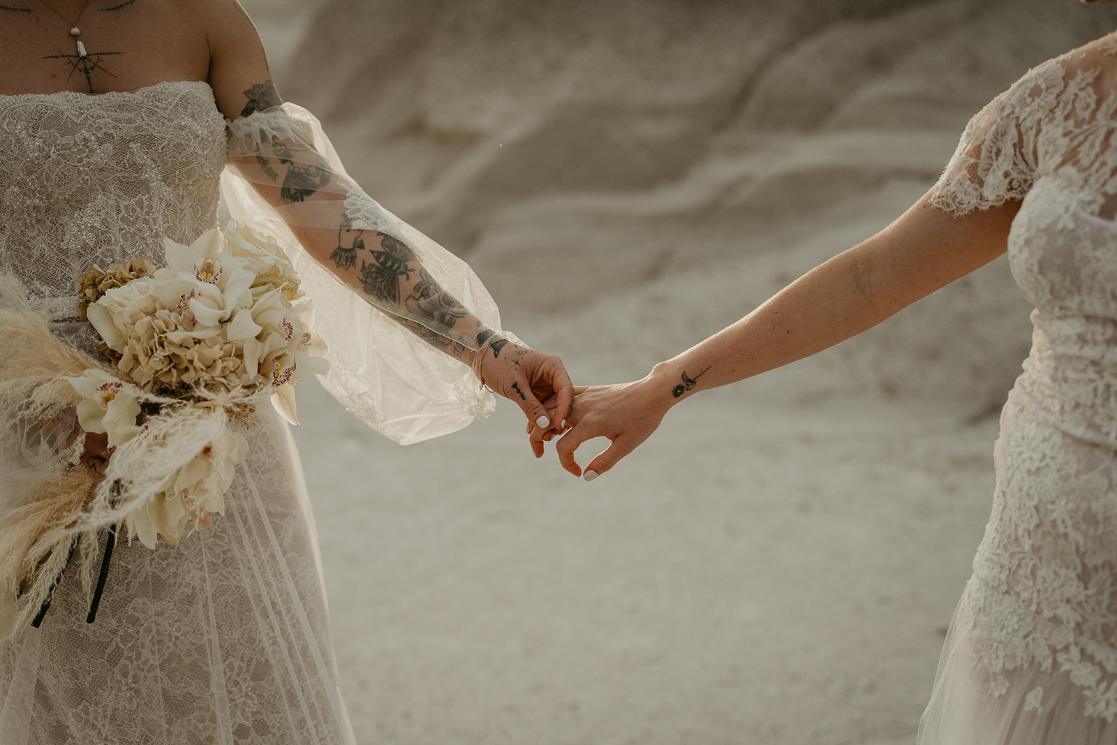 newlyweds holding hands.