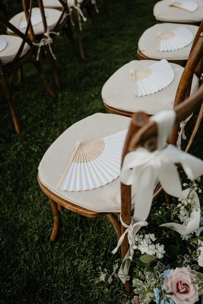 fans on a chair at the Brasada Ranch wedding space.